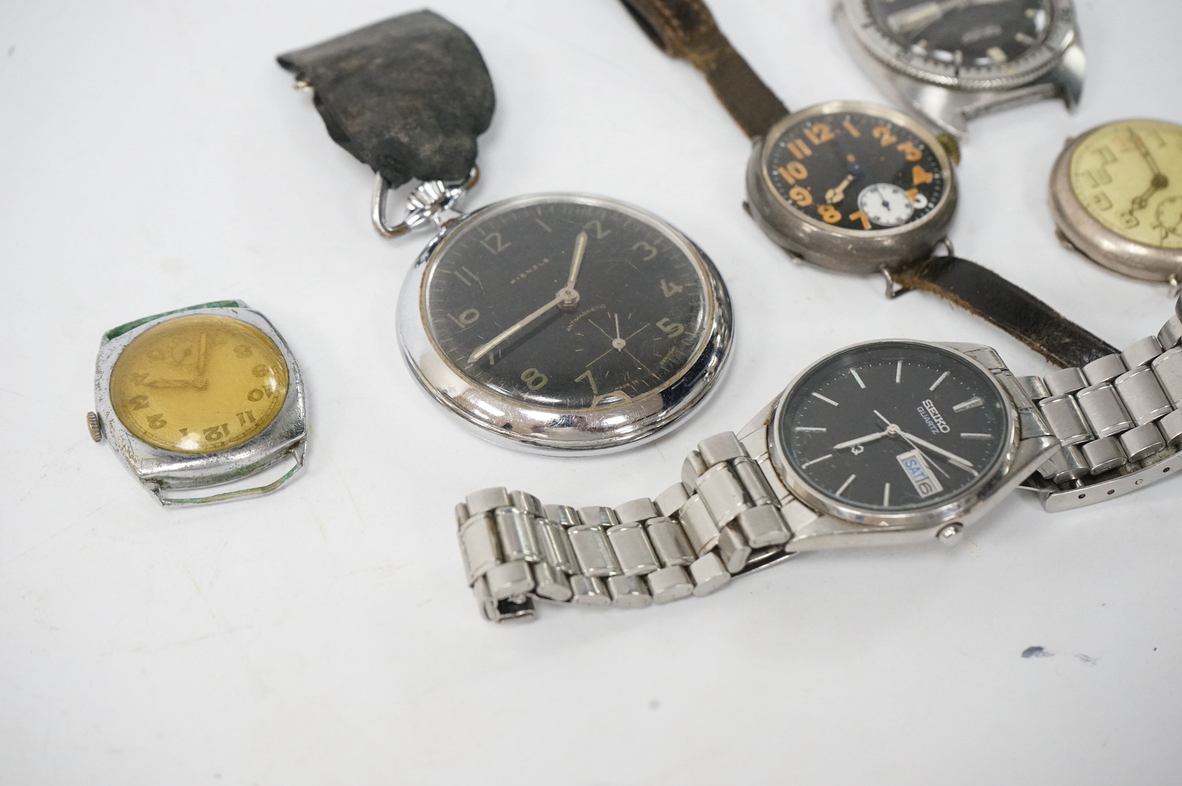 Five assorted gentleman's wrist watches including a 1916 silver trench watch, one other silver wrist watch, a base metal wrist watch and two later Seiko wrist watches, together with a chrome cased Kienzle pocket watch. C